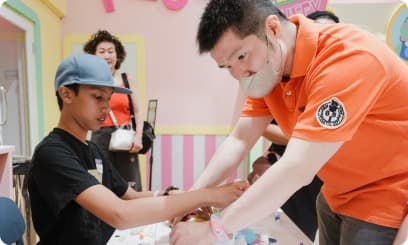 Families and children enjoying an inclusive community event